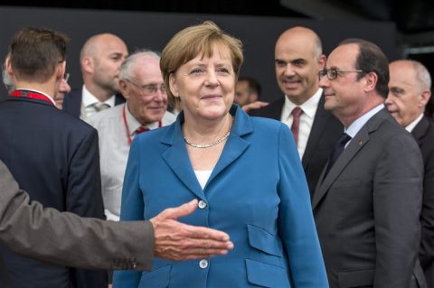 Angela Merkel en François Hollande bij de opening van de Gotthardtunnel, foto: ANP